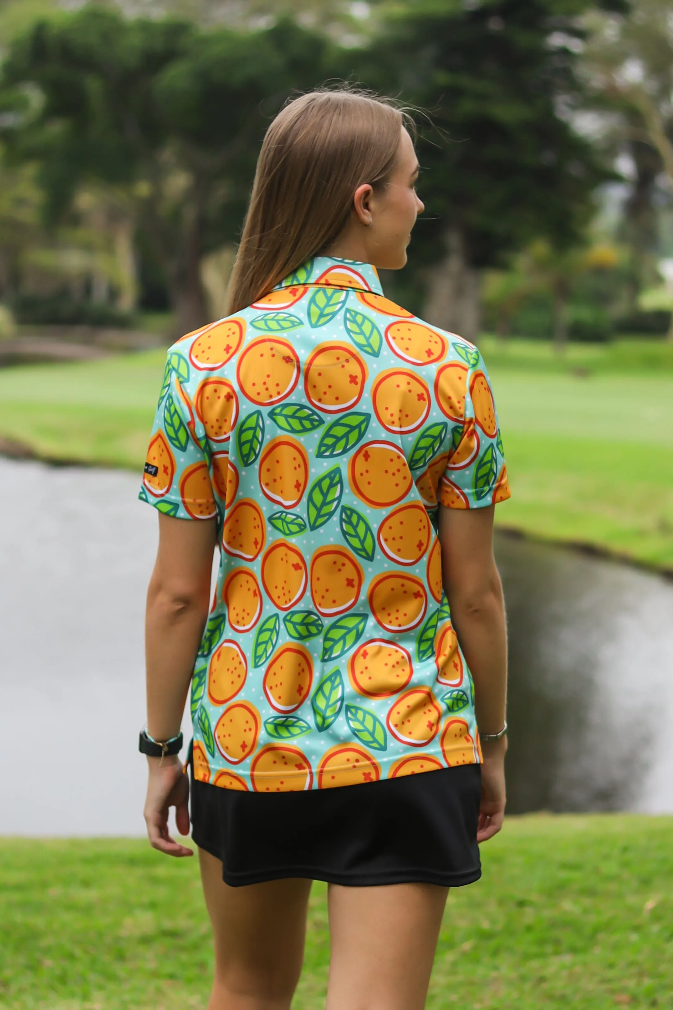 CA Ladies Funky Golf Shirt | Turquoise Oranges