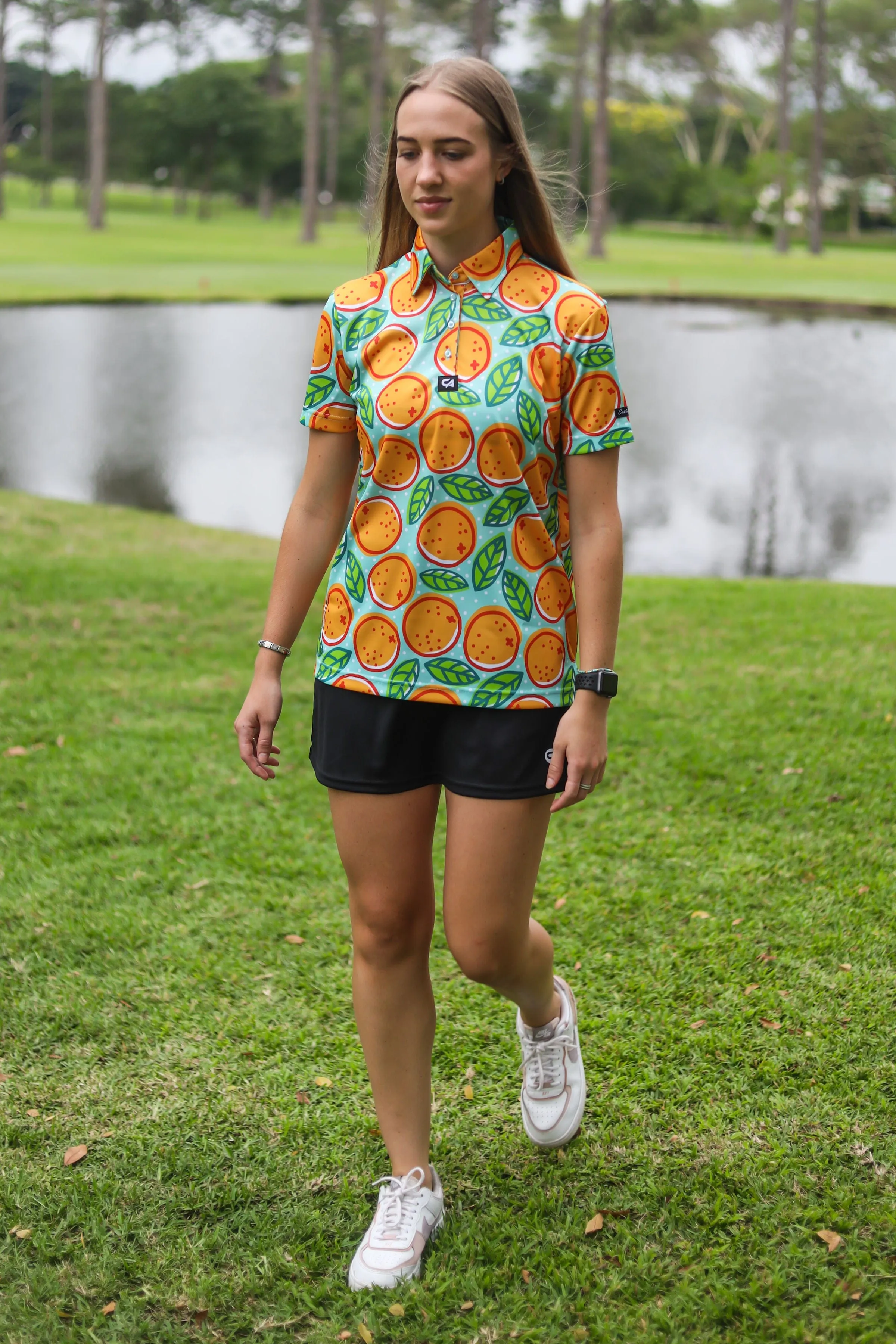 CA Ladies Funky Golf Shirt | Turquoise Oranges